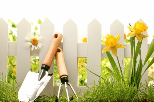 Local hedge trimming service creating a tidy garden finish in Bow